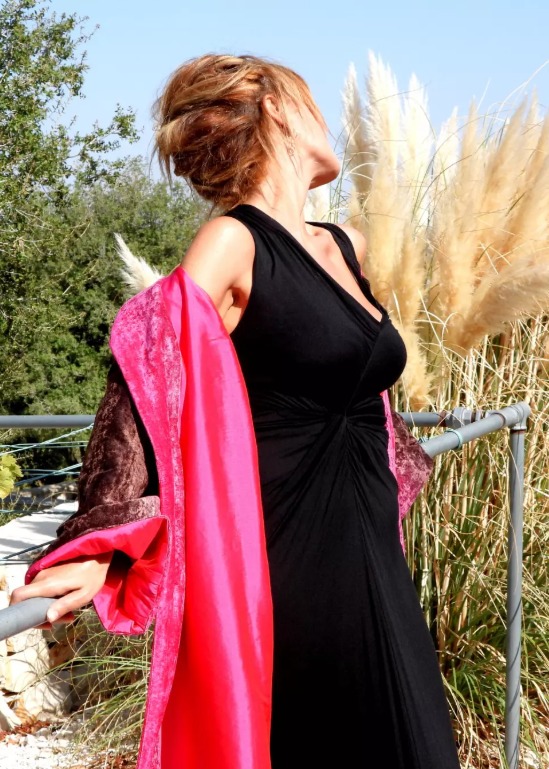 Roula Harb — Brown Velvet Robe, side view by pampas grass