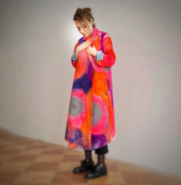 Roula Harb — Coral and purple painted coat, studio