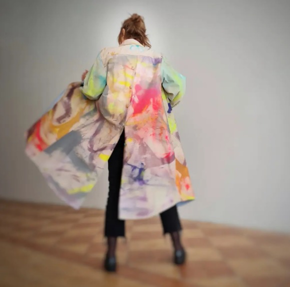 Roula Harb — Back view of painted coat, studio